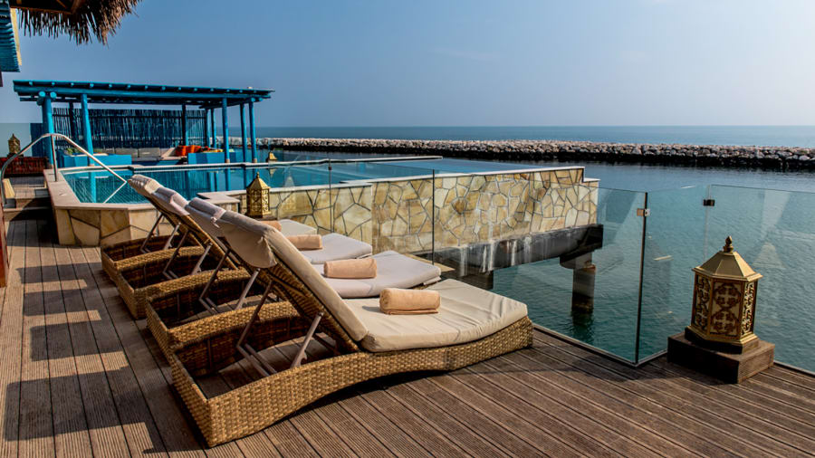 Luxury resort off Doha coast, shaped like Banana